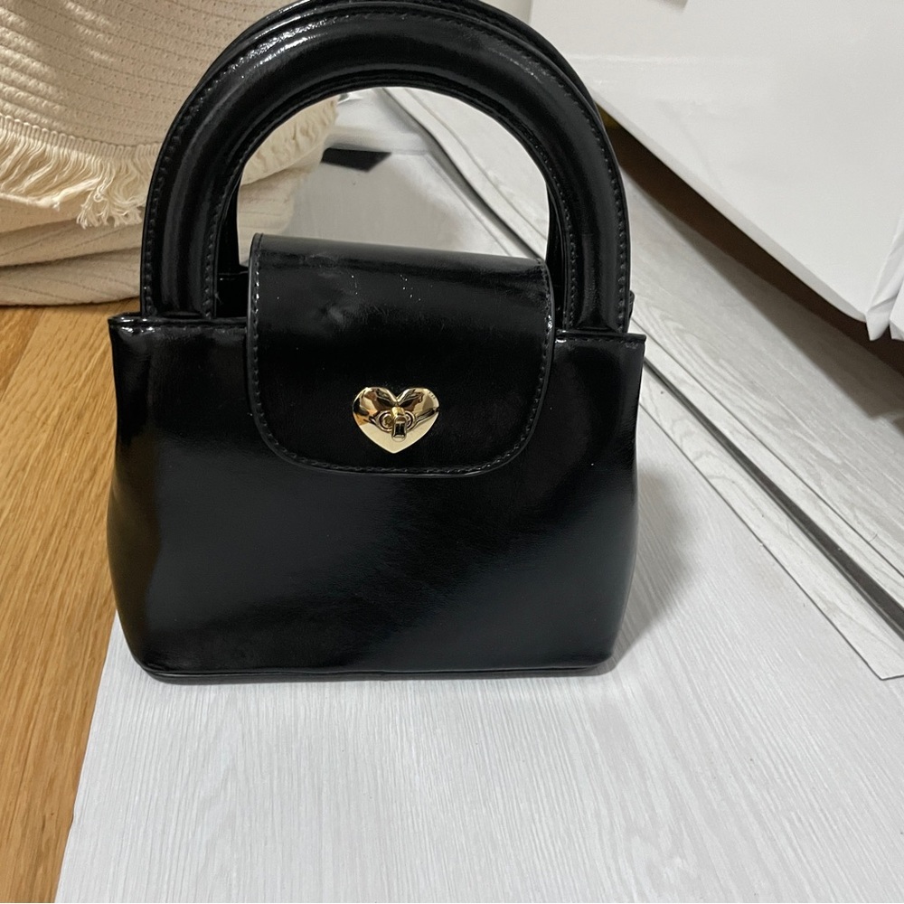 Black Leather Handbag with Gold Heart Lock
